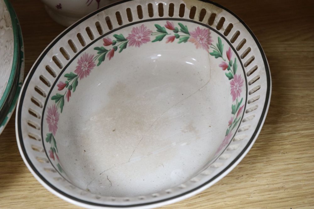 A 19th century German porcelain hot water jug, two Regency porcelain dishes a pair of Wilson pearlware dishes and a Wedgwood basket